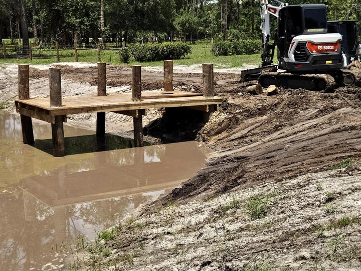 New culvert crossing with timber bridge, Central Florida
