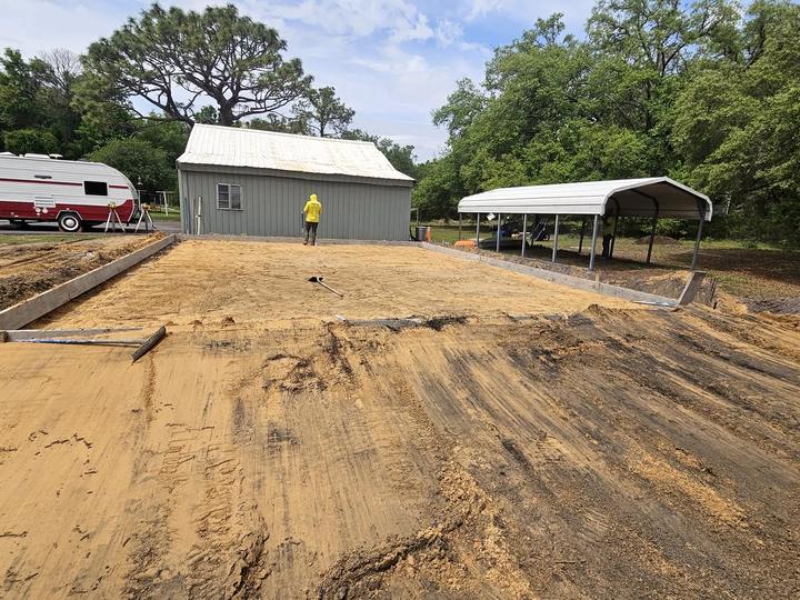 Compacted sand pad up to the carport, Central Florida