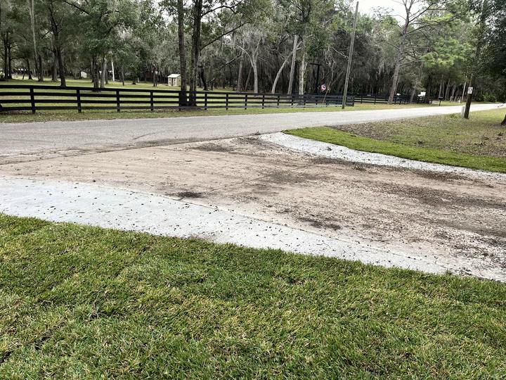 Limerock drive along a board fence, Central Florida